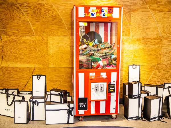 A custom claw machine at the birthday party