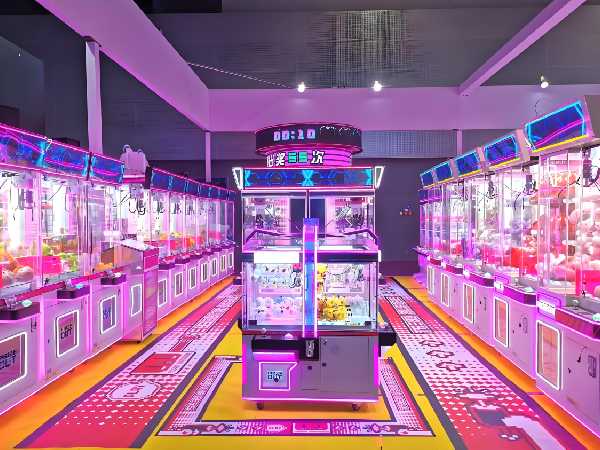 Brightly colored claw machines drawing attention in a shopping mall