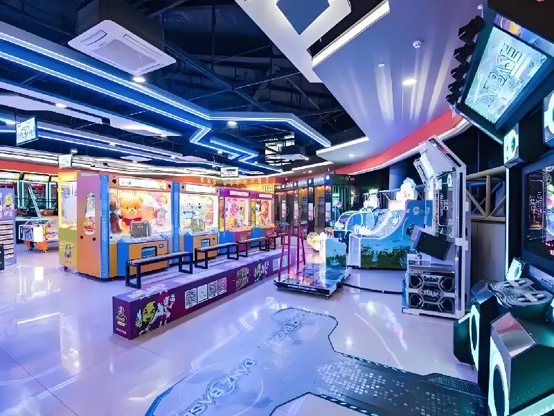 Large integrated game center with different types of arcade machine
