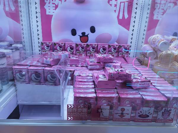 Snack-filled claw machine