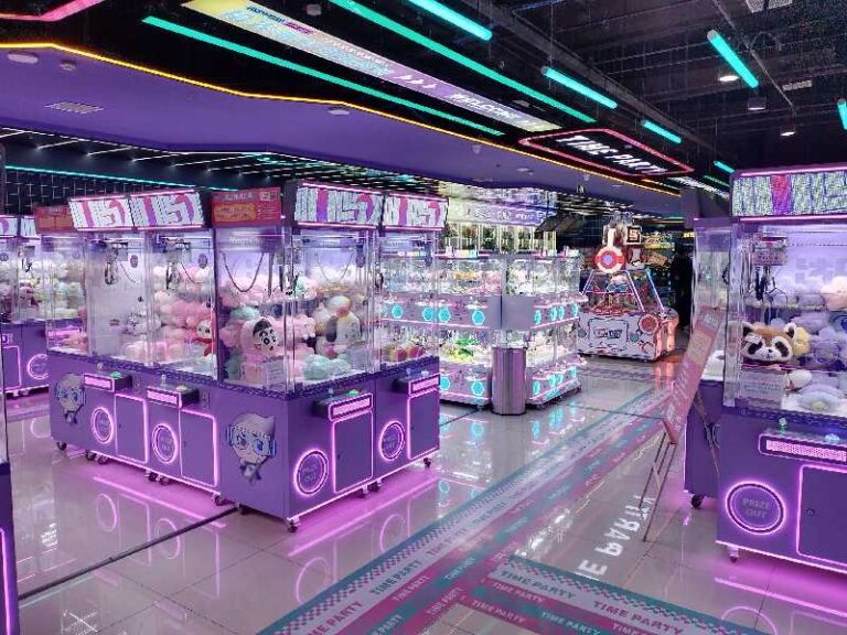 A commercial arcade filled with various claw machines