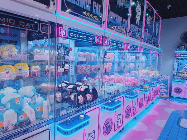 A standard claw machine customized with LED lighting