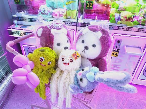 Player winning big at a claw machine